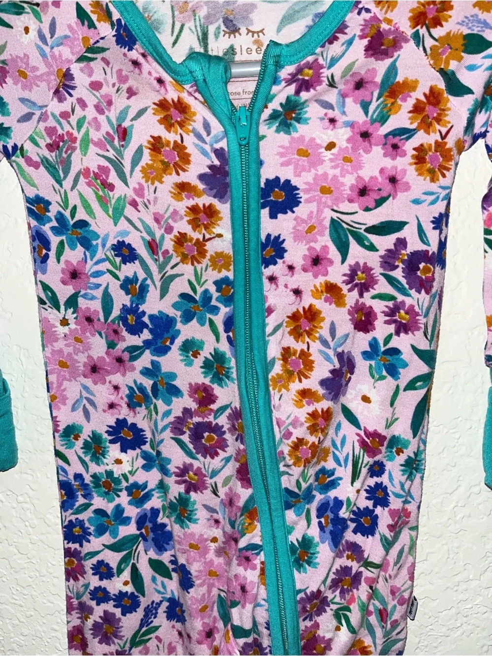 Little Sleepies floral zippered footie pajamas